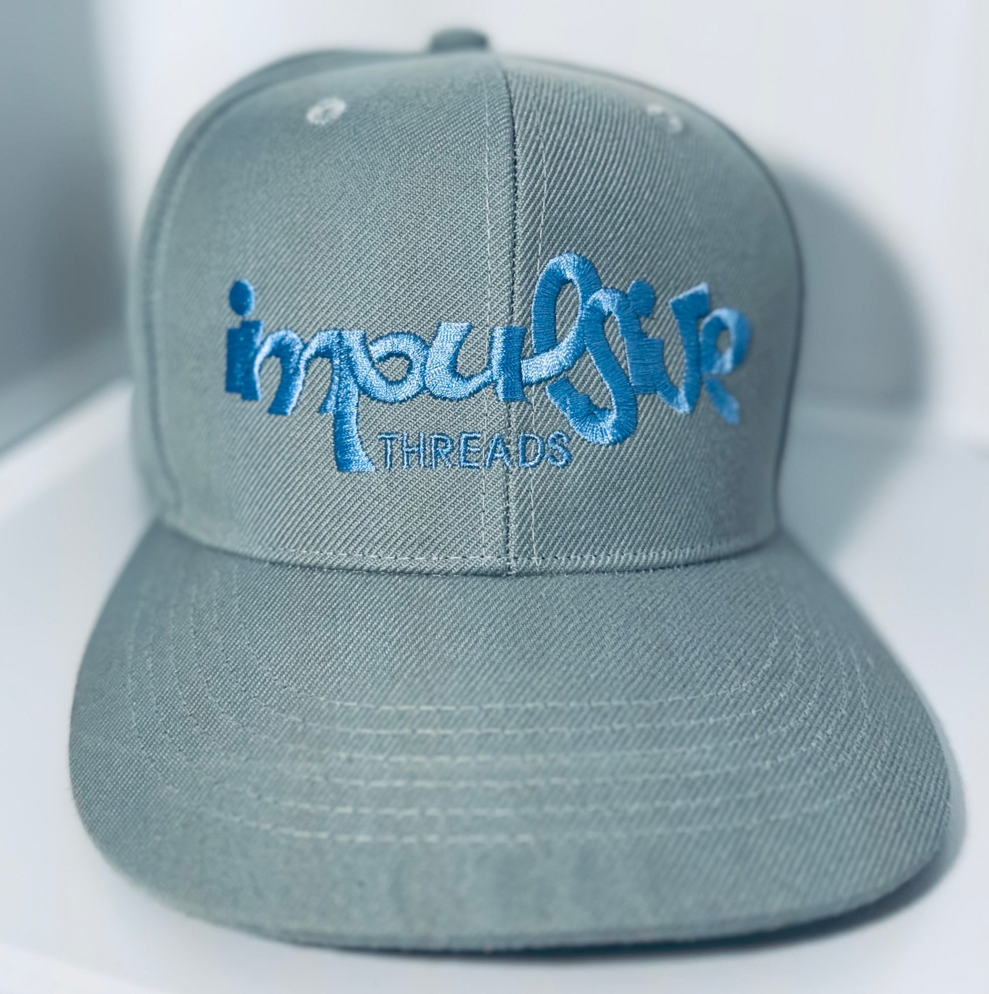 Impulsive Threads Cap
