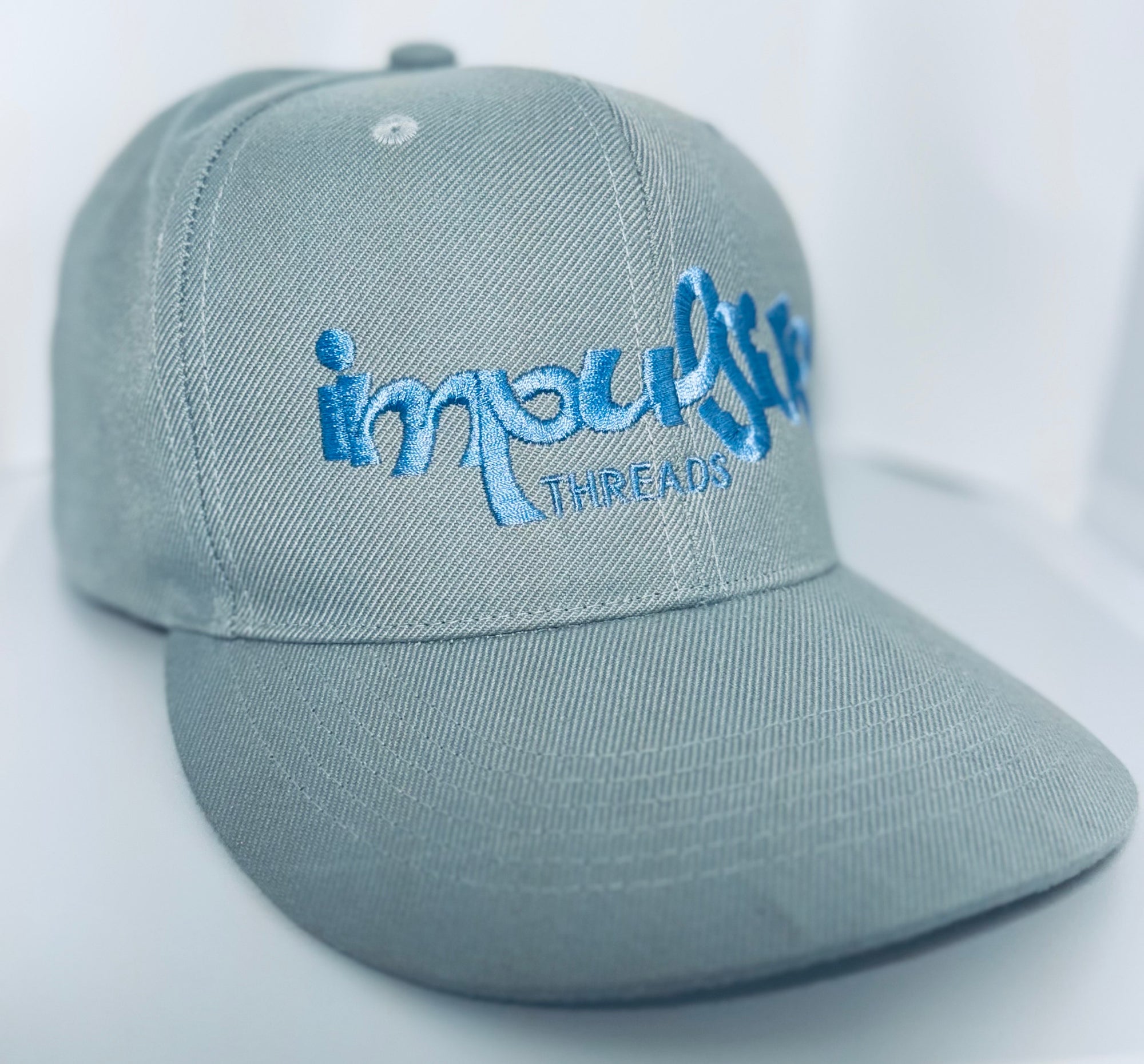 Impulsive Threads Cap